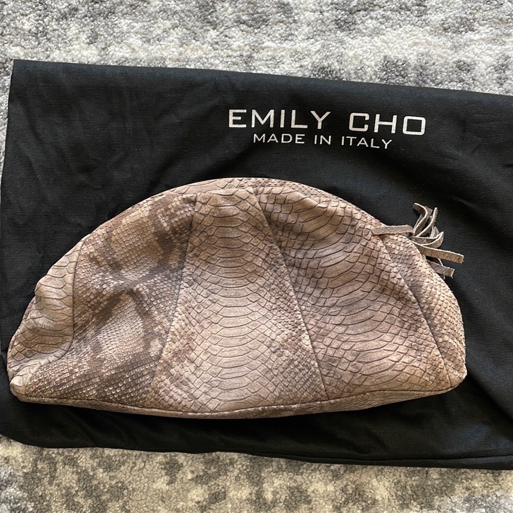 Greige embossed moon clutch with zip.